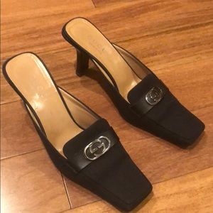 Pair of black Gucci mules